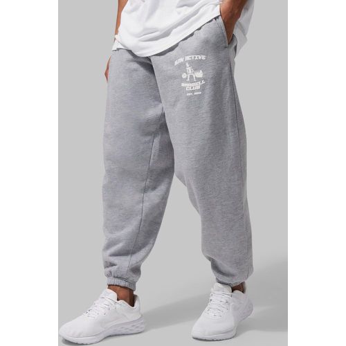 Pantaloni tuta oversize Man Active Barbell Club - boohoo - Modalova