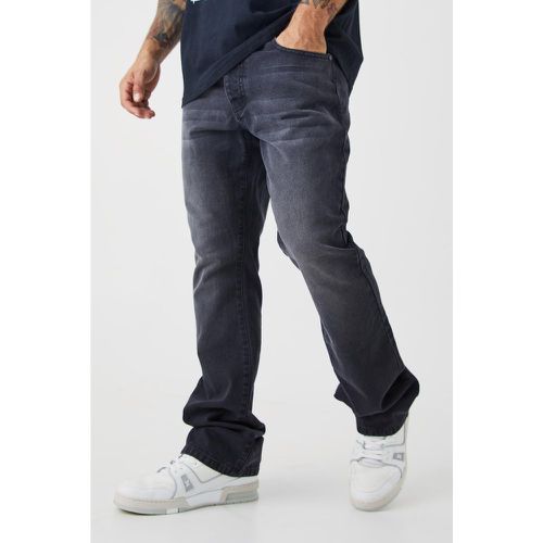 Jeans a zampa Slim Fit in denim rigido - boohoo - Modalova