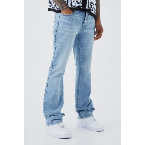 Jeans a zampa Slim Fit in denim rigido - boohoo - Modalova