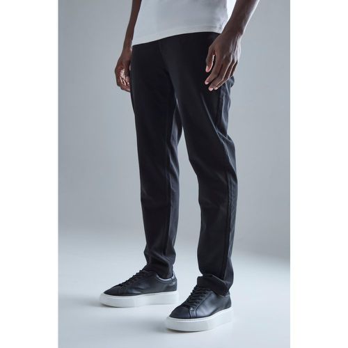 Pantaloni in Stretch tecnico Slim Fit con vita fissa - boohoo - Modalova