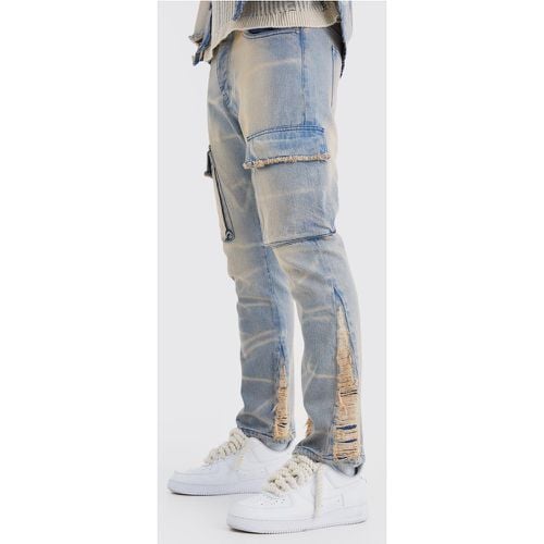 Jeans Cargo Slim Fit in denim rigido sovratinti a effetto consumato - boohoo - Modalova