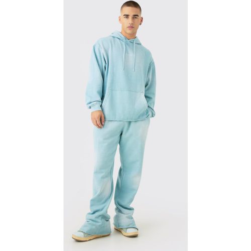 Tuta sportiva oversize in lavaggio candeggiato con ricami Man e cappuccio - boohoo - Modalova