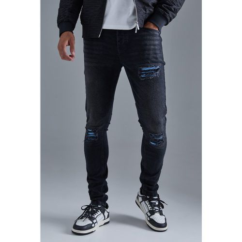 Jeans da biker Skinny Fit Stretch azzurri in PU con strappi & rattoppi - boohoo - Modalova