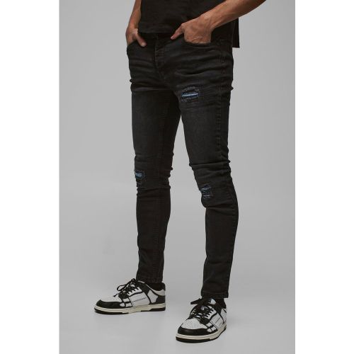 Jeans da biker Skinny Fit Stretch azzurri in PU con strappi & rattoppi - boohoo - Modalova