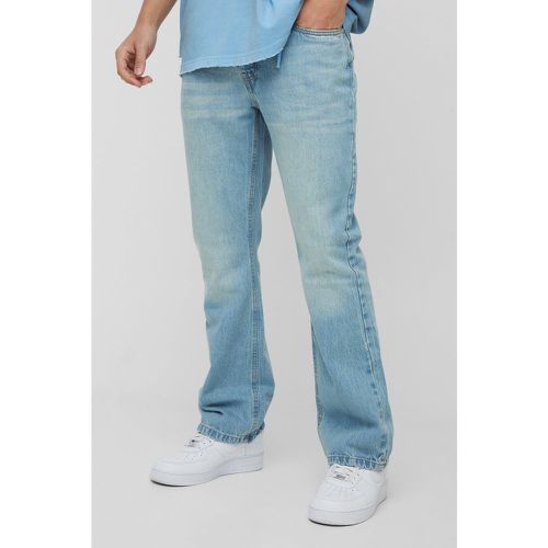 Jeans a zampa Slim Fit in denim rigido blu antico - boohoo - Modalova