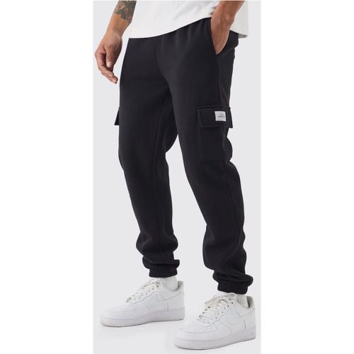 Pantaloni tuta Cargo Slim Fit Basic con etichetta intessuta - boohoo - Modalova