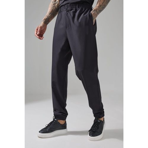 Pantaloni tuta da golf Tall Man Active con polsini alle caviglie - boohoo - Modalova