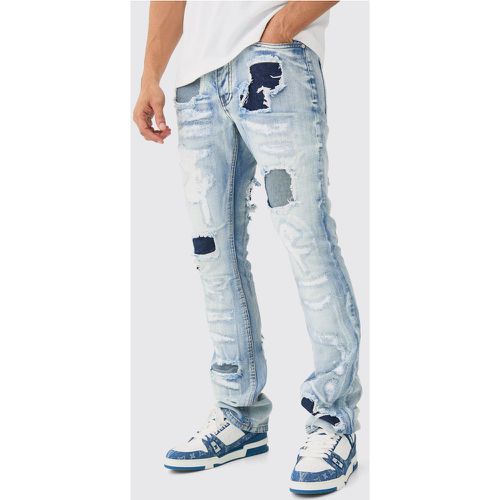 Slim Rigid Flare Stacked Rip & Repair Jeans In Ice Blue - boohoo - Modalova