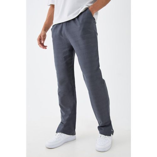 Pantaloni tuta Regular Fit in jacquard a righe rialzate con spacco sul fondo - boohoo - Modalova