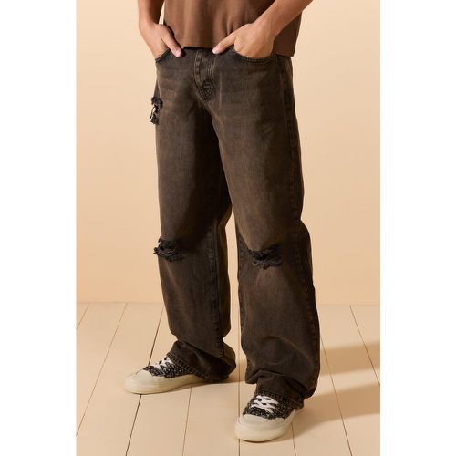 Jeans extra comodi in denim rigido slavato con strappi sul ginocchio - boohoo - Modalova