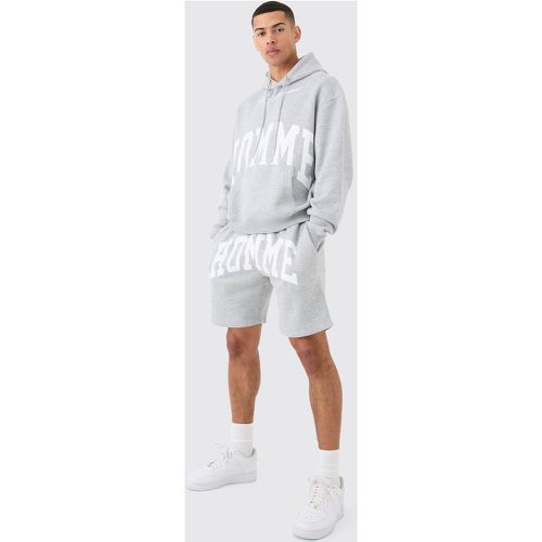 Tuta sportiva corta oversize squadrata Homme con cappuccio - boohoo - Modalova