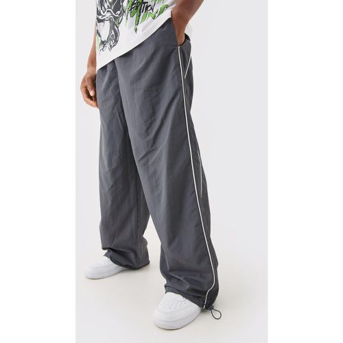 Pantaloni da paracadutista con striscia laterale elasticizzata in vita - boohoo - Modalova