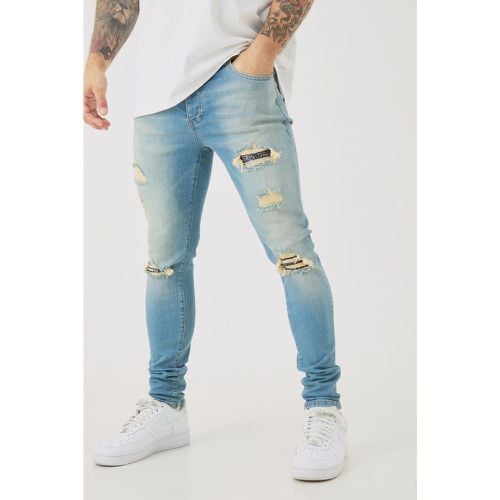 Jeans Skinny Fit Stretch in fantasia a bandana con strappi in - boohoo - Modalova