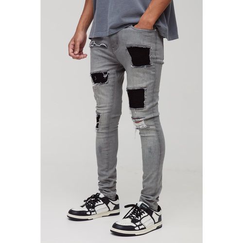 Jeans Super Skinny Fit strappati con applique - boohoo - Modalova