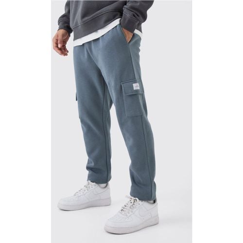 Pantaloni tuta Cargo Slim Fit Basic con etichetta intessuta - boohoo - Modalova