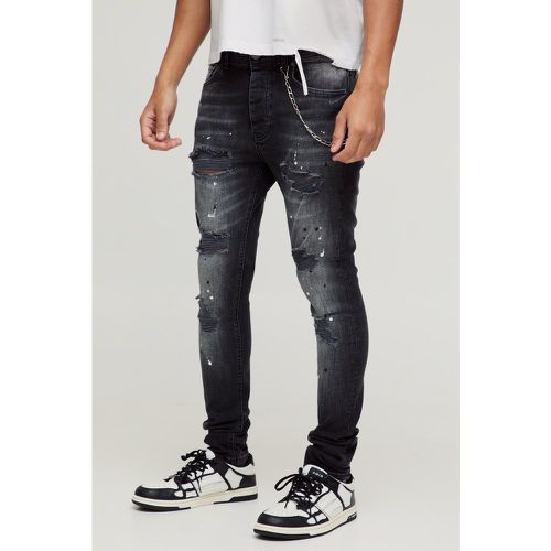 Jeans Super Skinny Fit in denim Stretch con strappi & rattoppi - boohoo - Modalova