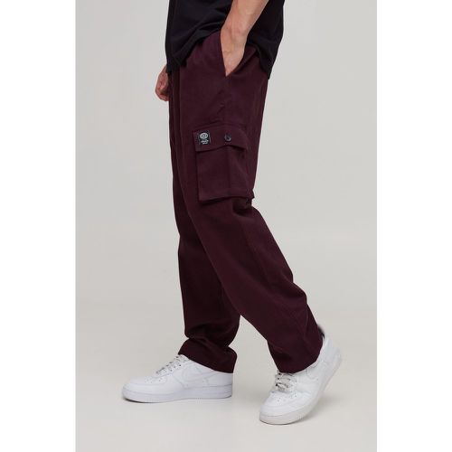 Pantaloni Skate alla caviglia elasticizzati in vita con etichetta intessuta - boohoo - Modalova