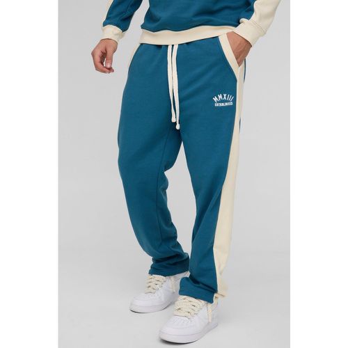 Pantalón Deportivo Ajustado De Tela Rizo Con Bordado, Panel Lateral Y Colores En Bloque - boohoo - Modalova