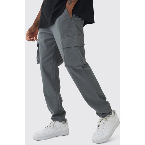 Pantaloni Cargo Tall Slim Fit con vita elasticizzata e polsini alle caviglie - boohoo - Modalova