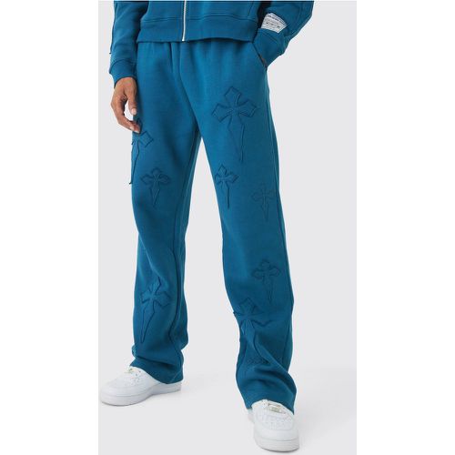 Pantaloni tuta rilassati con applique a croce - boohoo - Modalova