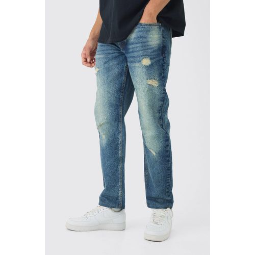 Jeans dritti in denim rigido con strappi sottili - boohoo - Modalova