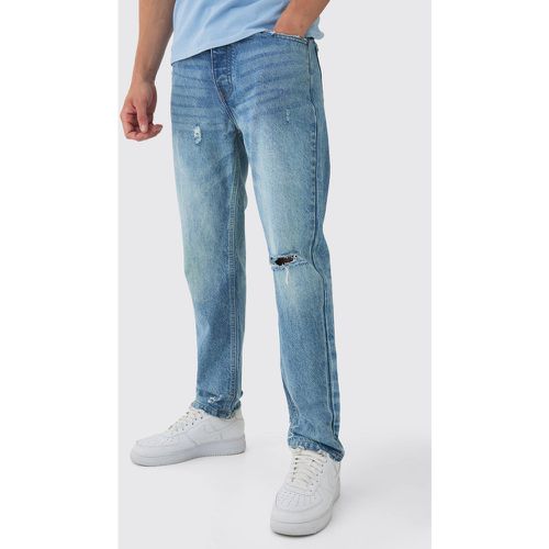 Jeans rilassati con strappi sul ginocchio - boohoo - Modalova