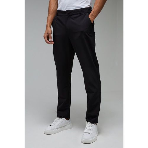 Pantaloni tuta affusolati Man Sport in tessuto Stretch - boohoo - Modalova