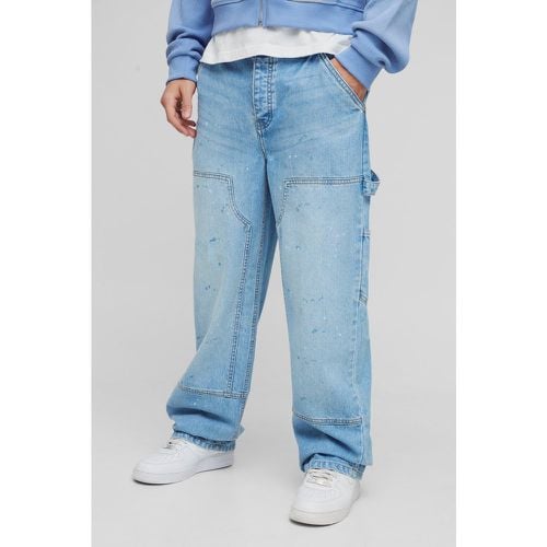 Jeans rilassati in denim rigido stile Carpenter con schizzi di colore - boohoo - Modalova