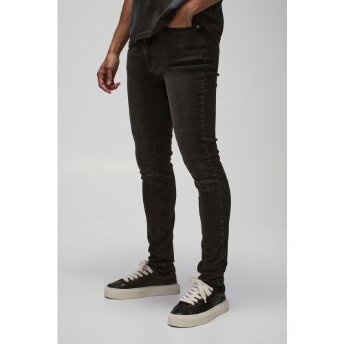 Jeans Skinny Fit Stretch slavati con pieghe sul fondo - boohoo - Modalova