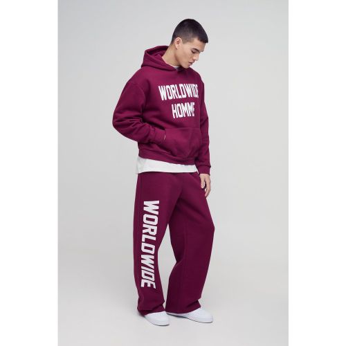 Tuta sportiva squadrata oversize con stampa Worldwide e cappuccio - boohoo - Modalova