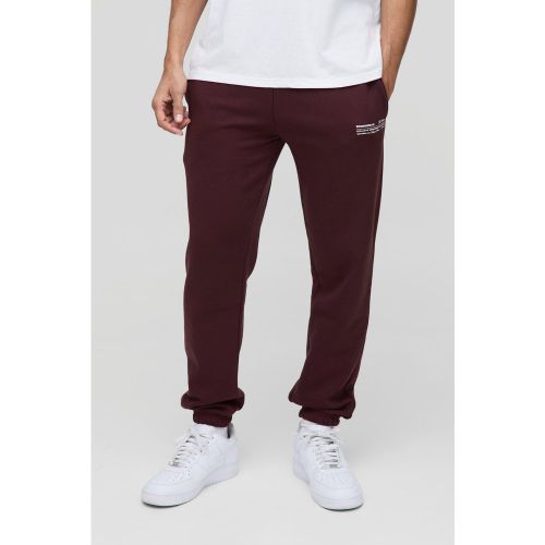 Pantaloni tuta Man Core Fit, Rosso - boohoo - Modalova