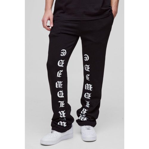 Pantaloni tuta a zampa Slim Fit con stampa e pieghe sul fondo - boohoo - Modalova