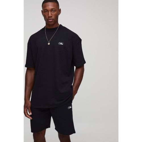 Set T-shirt oversize Man con scritta oversize e cuciture & pantaloncini - boohoo - Modalova