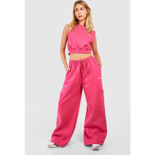 Pantaloni tuta Dsgn Studio con scritta Cargo e tasche Cargo - boohoo - Modalova