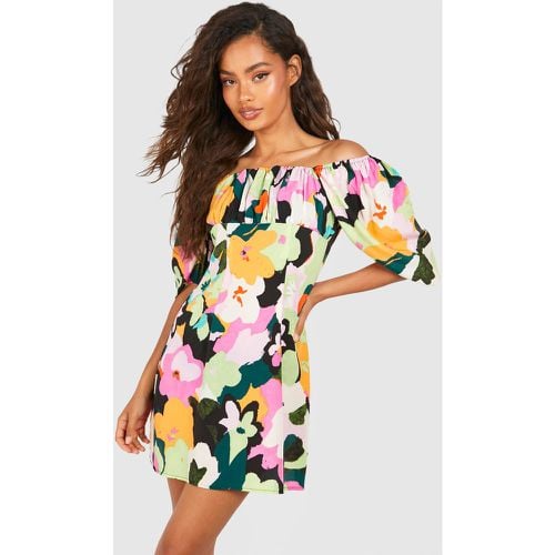 Vestito grembiule a fiori in colori accesi con maniche a sbuffo - boohoo - Modalova