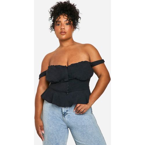 Top a corsetto Plus Size con volant sul fondo - boohoo - Modalova