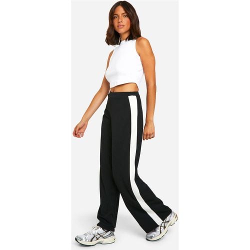 Pantaloni a gamba ampia con righe laterali - boohoo - Modalova