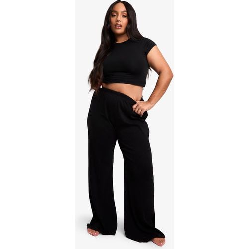 Pantaloni da casa Plus Size a coste a gamba ampia - boohoo - Modalova