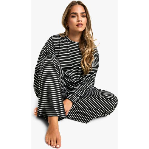 Set pigiama di Loungewear da casa Petite in jersey a righe con pantaloni lunghi - boohoo - Modalova