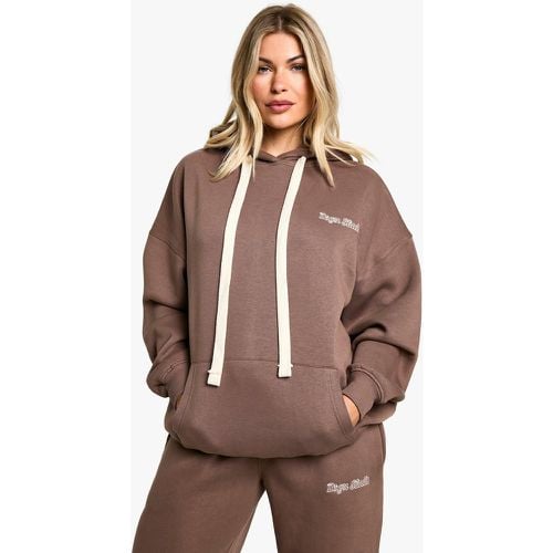 Felpa oversize con ricami Dsgn Studio, laccetti a contrasto e cappuccio - boohoo - Modalova