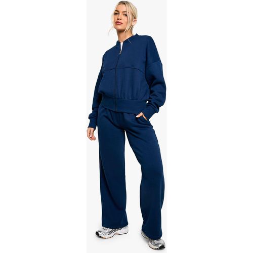 Tuta sportiva stile Bomber con zip e fondo profondo - boohoo - Modalova