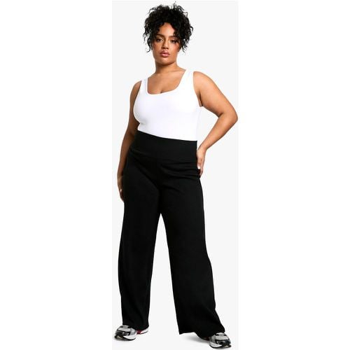 Pantaloni Plus Size a gamba ampia a coste pesanti - boohoo - Modalova