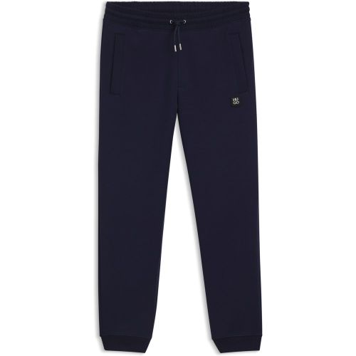 Bas de survêtement en coton mélangé avec logo revisité - HUGO - Modalova