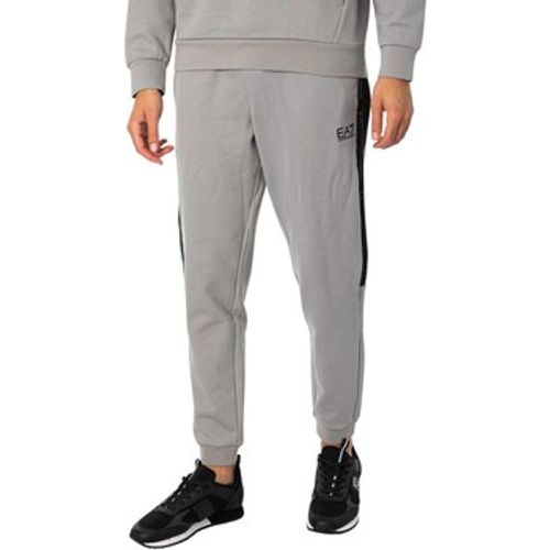 Trainingsanzüge Logo-Jogger - Emporio Armani EA7 - Modalova