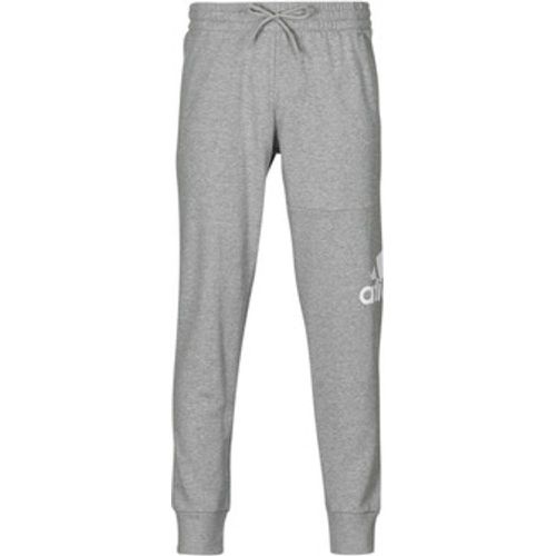 Trainingsanzüge Essentials French Terry Tapered Cuff Logo Joggers - Adidas - Modalova