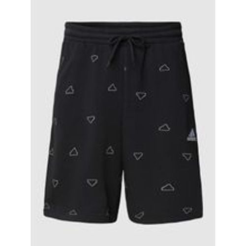 Shorts mit Allover-Label-Print - adidas Sportswear - Modalova