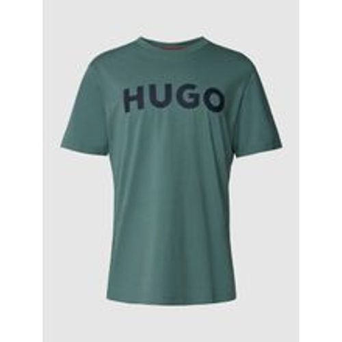 T-Shirt mit Motiv-Print und Logo-Print sowie Regular Fit - HUGO - Modalova