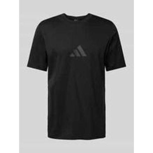 T-Shirt mit Label-Print - adidas Sportswear - Modalova