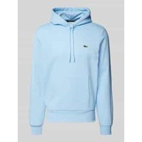 Regular Fit Hoodie mit Baumwolle - Lacoste - Modalova