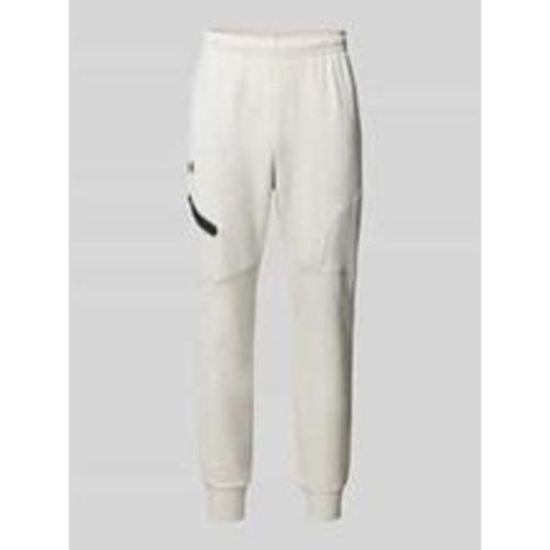 Relaxed Fit Sweatpants mit Logo-Print Modell 'Unstoppable' - Under Armour - Modalova